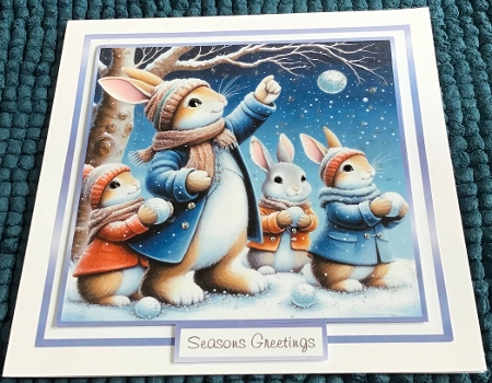 bunnies and snowman by Sharron Hylton