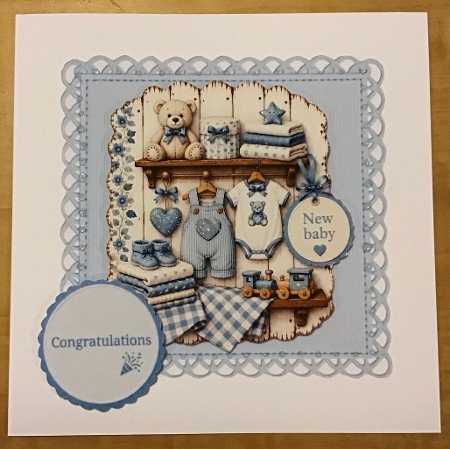 Blue New Baby Boy Card Topper – Clothes, Teddy & Nursery Shelf by Sharron Hylton