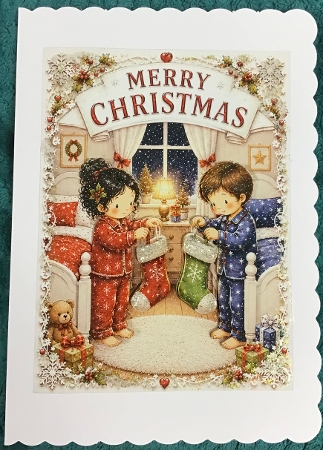 lucy and george  hanging stockings bedroom by Sharron Hylton