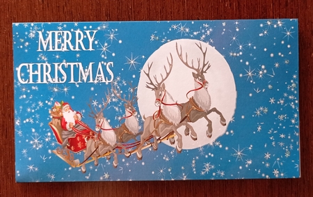 Santa on his sleigh money wallet. by S.Elisabet Osborn Wright