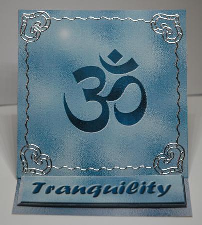 Om Symbol in Blue Easel by Sherry Day