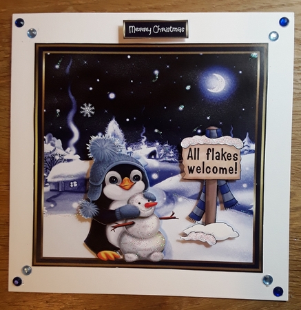 Penguin builds a snowman 6x6 by Shirley Taylor