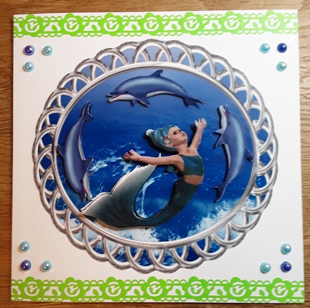 Swim with Dolphins - 6 inch circular topper with decoupage. by Shirley Taylor