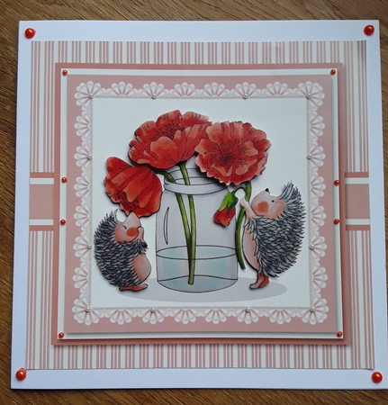 Hedgehogs in the flowers by Shirley Taylor
