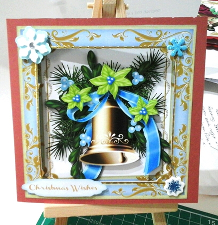 Beautiful Gold Bell and Blue Ribbon  by Stephanie Bardelli