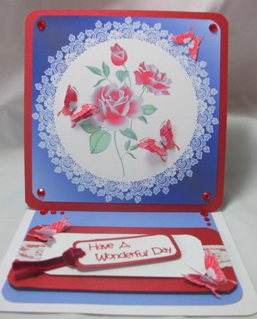 Red Butterflies on Roses and Lace by Sue Needham