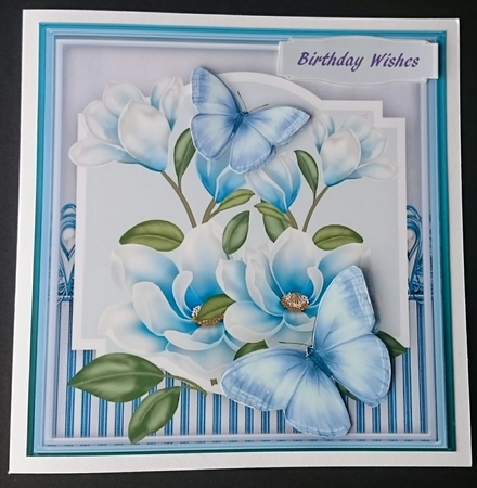 Beautifulbblueflutters and Magnolias  by Sue Soules