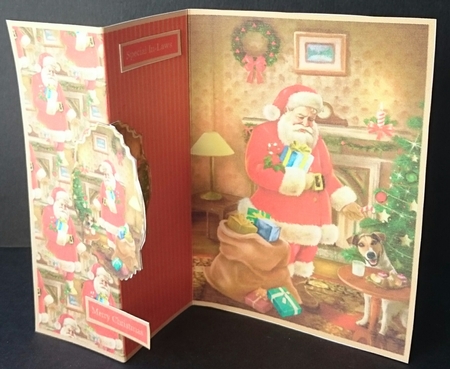 Santas visit fold back card with topper for front and back with sentiment tags by Sue Soules