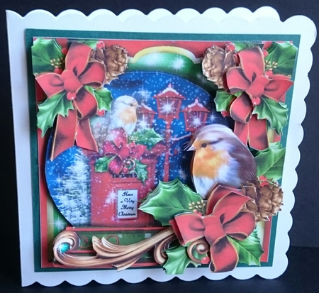 A Christmas Robin Snowglobe by Sue Soules