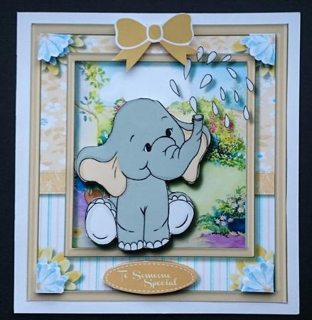 Lovely Buff Ellie Watering the Garden by Sue Soules