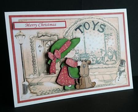 Big Hat Girl in Christmas Street Scene Decoupage by Sue Soules