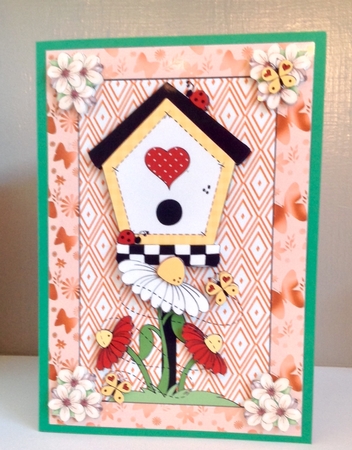 Orange bird house insert by Susan Byczko