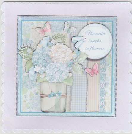 Vase of Pretty Blue Flower and Butterflies by Susan Cummings