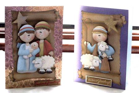 Nativity with Sheep on a Scroll Toppers by Susan James