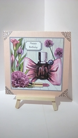 Perfume and petals in purple by Susan Lapornik