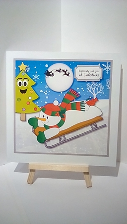 Snowman Sledging by Susan Lapornik