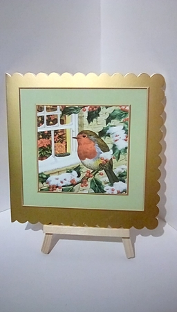 Cute little Robin in the snow 7x7 with pyramids by Susan Lapornik
