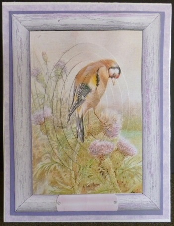 Little Bird in a Frame with Flowers Oval Pyramids by Susan Powell-Barton