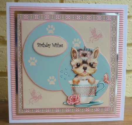 in a tea cup by Susan Skipper
