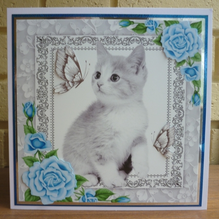 Gorgeous Grey Kitten With Blue Roses 8x8 by Susan Skipper
