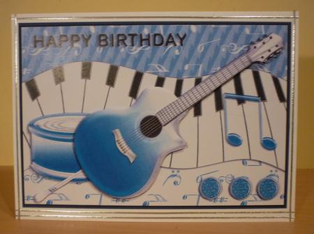 Guitar and Music Blue Birthday Card Front by Susan Skipper