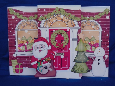 3D Christmas Up Front Card -  Santa is Delivering a Sack of Presents to the Front Door by Susan Smith