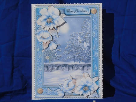 Christmas Scene With Blue Flowers  by Susan Smith