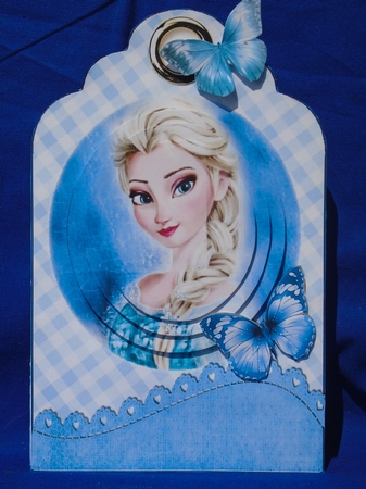 Pretty Ana With Blue Butterfly on a tag with bow by Susan Smith