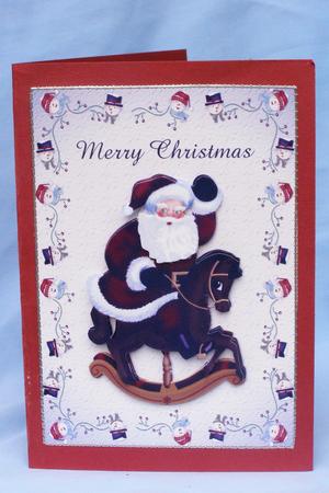 Christmas Rocking Horse Card Front by Susan Smith