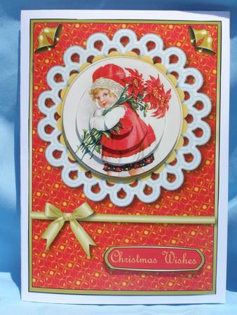 Girl with Poinsettias Pyramid (red) by Susan Smith