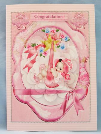 Baby Girl with Flower Shape Pyramage by Susan Smith