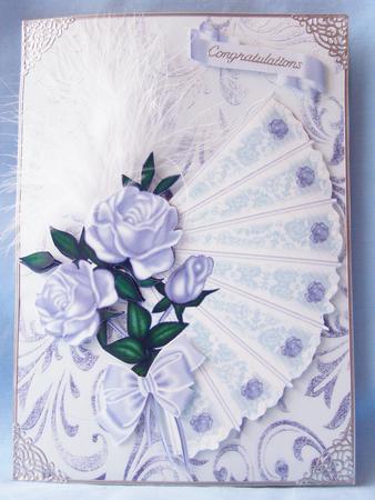 Pretty Silver Roses on Lace Fan with Bow by Susan Smith