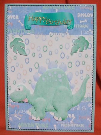 Lovely Green Dinosaur with Bones & Leafs by Susan Smith