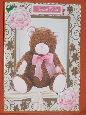 Big Brown Cuddly Bear in Floral Frame with Bow by Susan Smith