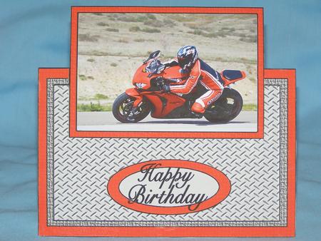 Red Motorbike Over the Edge by Susan Smith