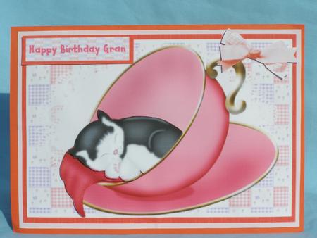 Little Kitten Taking Forty Winks in the Tea Cup by Susan Smith