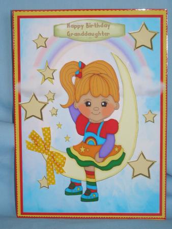 Rainbow Girl Sitting on the Moon by Susan Smith