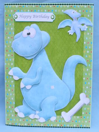 Big Blue Dinosaur in Green Spotty Frame by Susan Smith