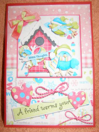 A Friend Warms Your "heart" Christmas Card Front Pink by Susan Smith