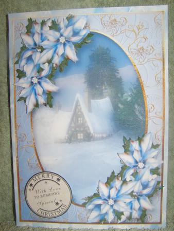 Snowy Christmas Cottage & Ice Blue Poinsettias by Susan Smith