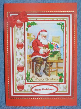 Santa Clause Painting the Toys . by Susan Smith