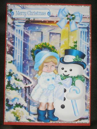Little Girl in the Snow with Snowman by Susan Smith