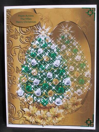 Christmas Tree with Lights and Poinsettia by Susan Smith