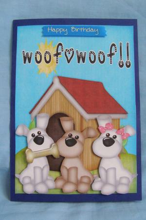 Cute Puppies in the Dog House by Susan Smith