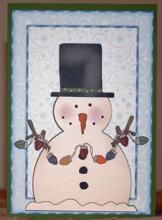 Xmas Snowman with Xmas Lights Card Front by Susan Wellhausen