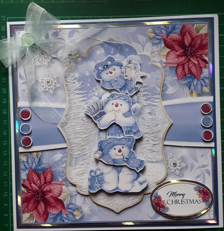 A Snowman Pile by Susan Heanes