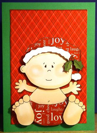 Cute Christmas Baby Boy in White Frame by Susie Woodward