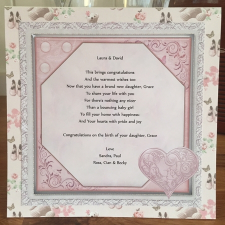 Baby Girl with Roses by Suzanne Kavanagh