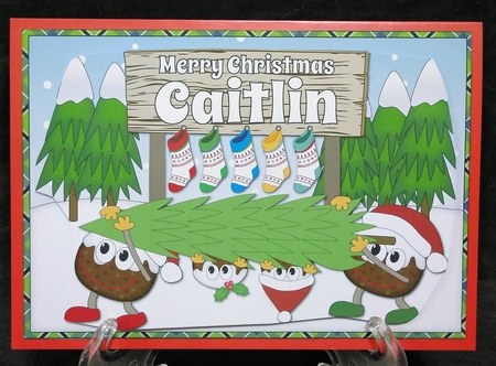 Crazy Christmas Puddings taking the Christmas Tree home and sign CAITLIN by Suzi Cooper