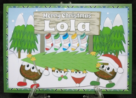 Crazy Christmas Puddings taking the Christmas Tree home and sign LOLA by Suzi Cooper
